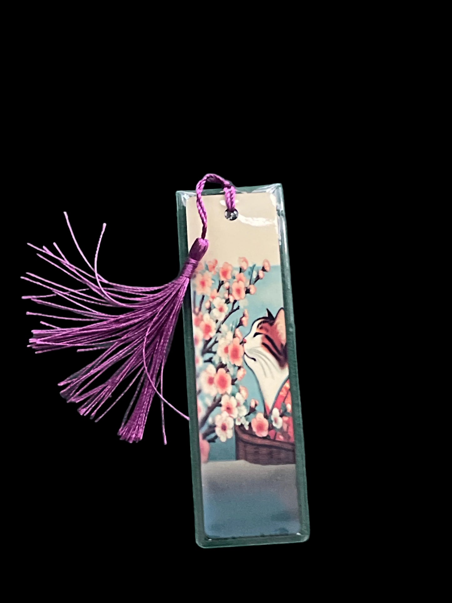 Cat smelling flowers