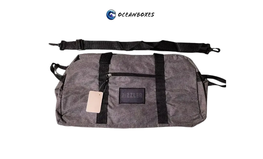 Rizzlwr patch on a Gray duffel bag with black straps and Oceanboxes logo on a white background